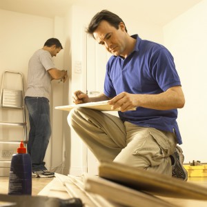 Men doing home improvement
